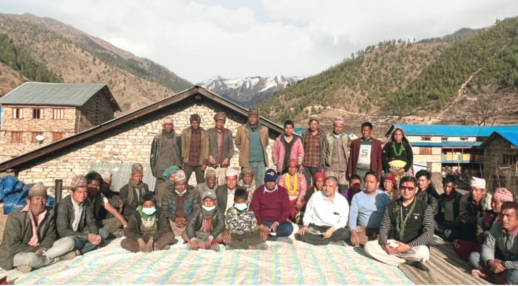 (Seated first row, from R) RITS Nepal head Ram Raje Singh, Rtn Rajaram Luitel and PDG Bhat with the villagers.