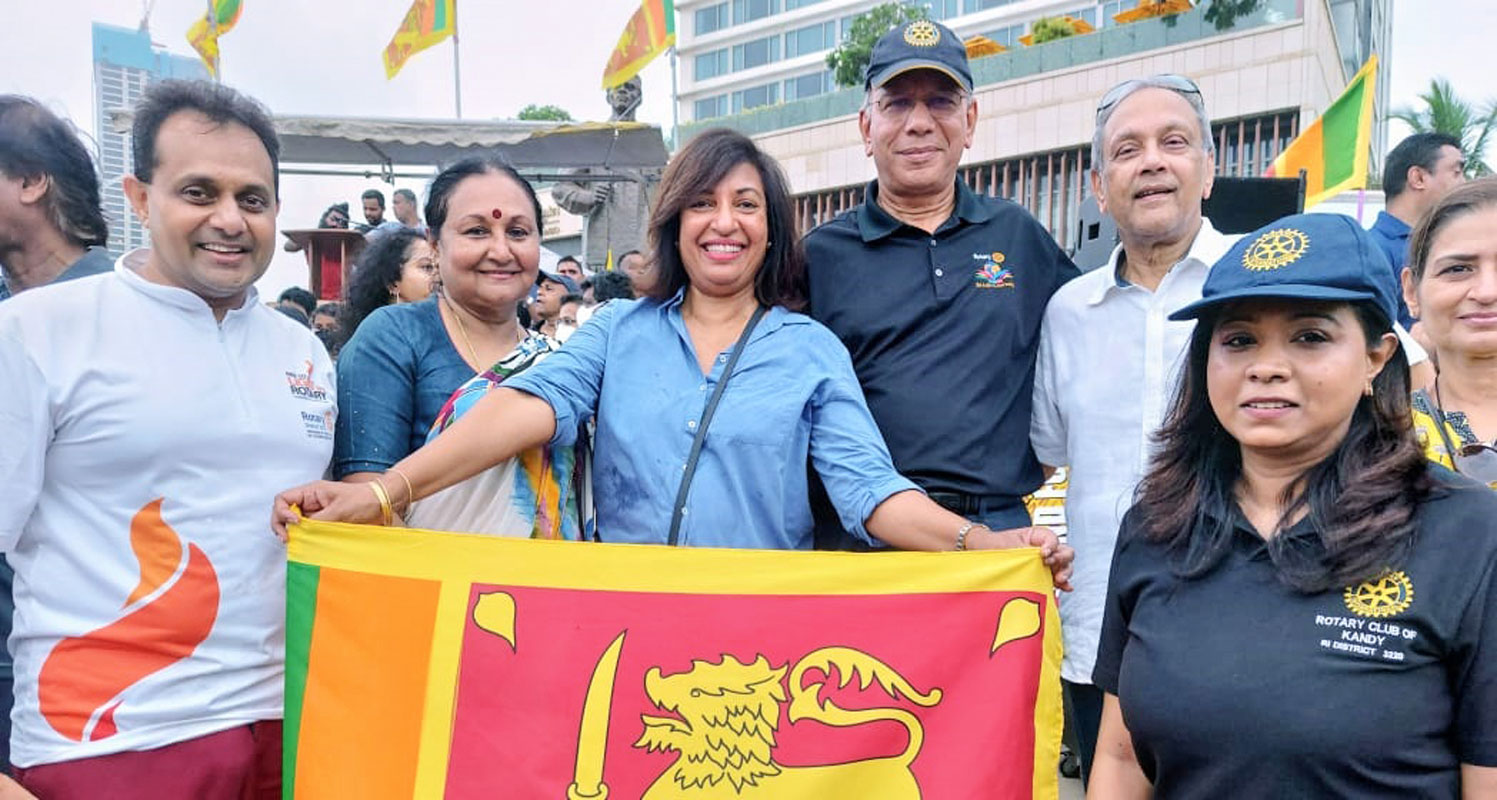 Past RI President K R Ravindran (third from R) and Vanathy (second from L) participating in the solidarity walk. PDG Gowri Rajan is on the right. 