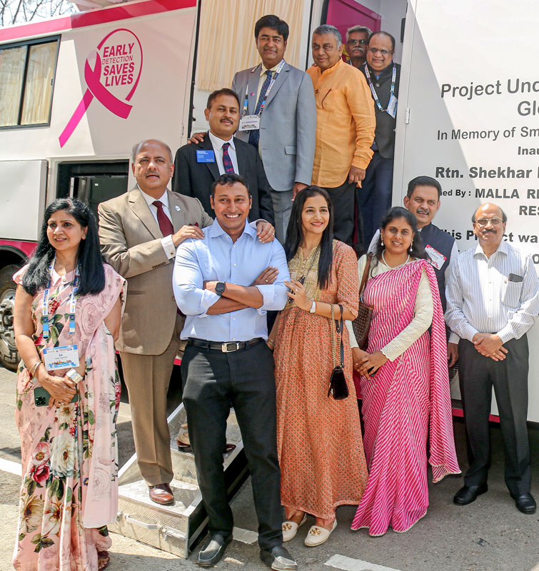 President Mehta, RID Mahesh Kotbagi, RID A S Venkatesh, Conference Chair Ravi Vadlamani in front of the mammography van sponsored by RC Ameerpet. PDG Ramesh Vangala is seen second from right.