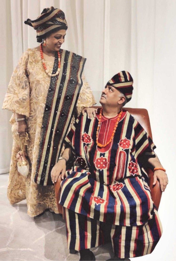 RI President Shekhar Mehta and Rashi in Nigerian costume.