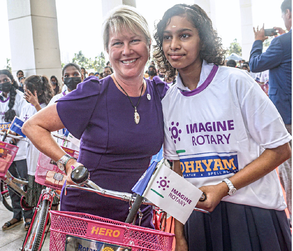 RI President Jennifer Jones with a student who received a bicycle under the ‘Tring a smile’ project of the RI districts of Tamil Nadu and Kerala. 