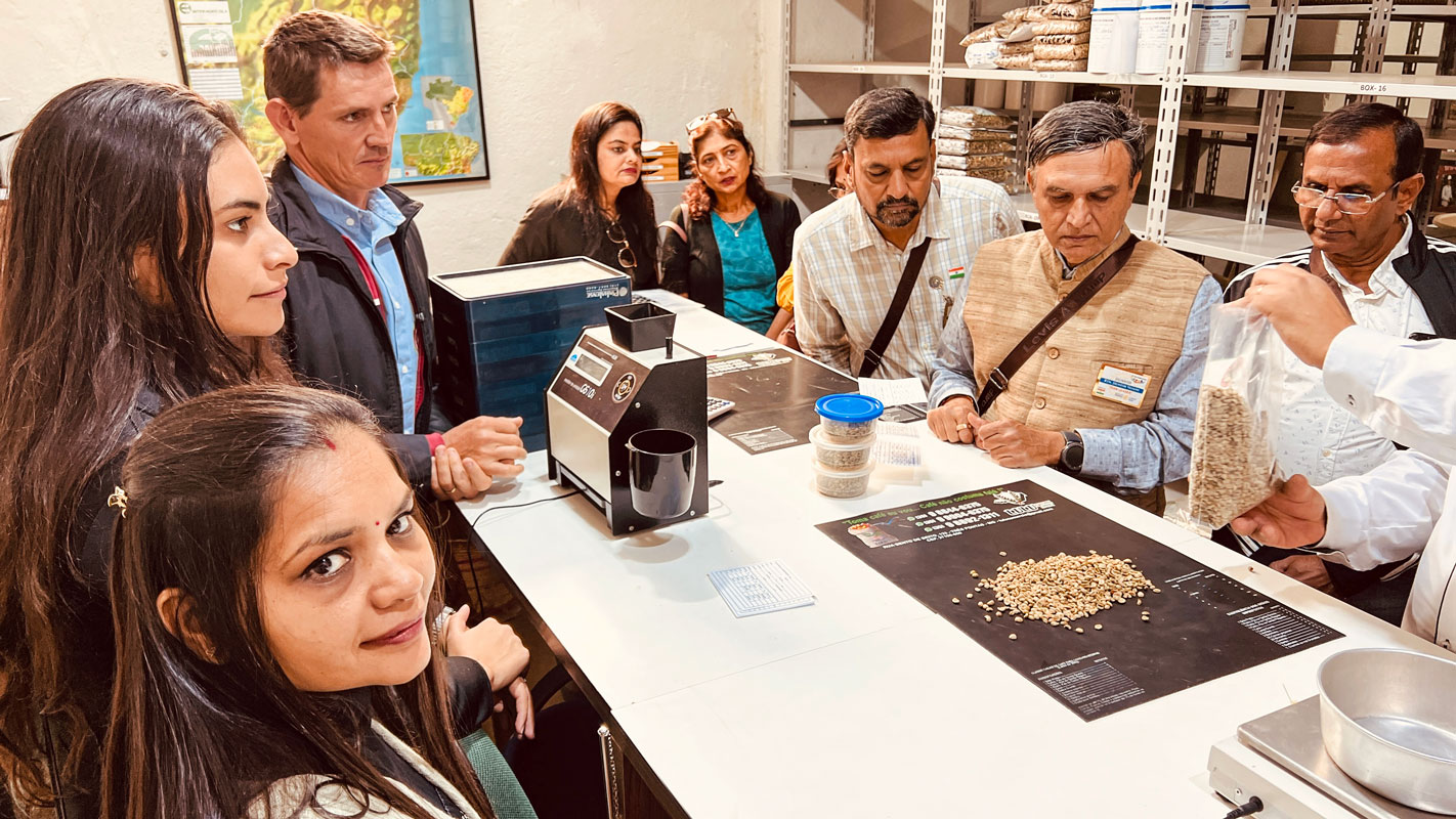 RFE team leader Jignesh Vasani and delegates at a coffee production facility in Brazil.
