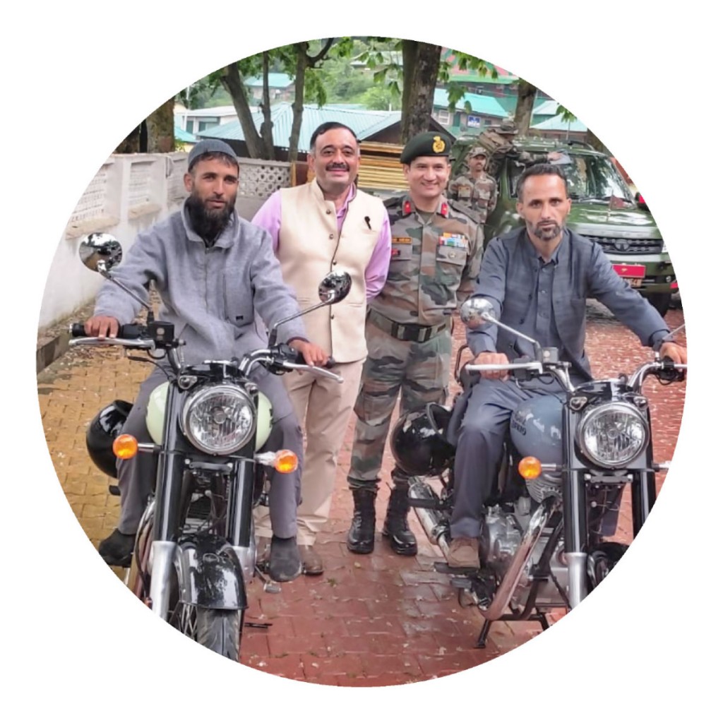 Motorcycle ambulances, donated by RID 3141, being presented to the sarpanch and maulvi of Machhal village in the presence of GOC Maj Gen Abhijit S Pendharkar and Brig Vinod Negi (second from R).