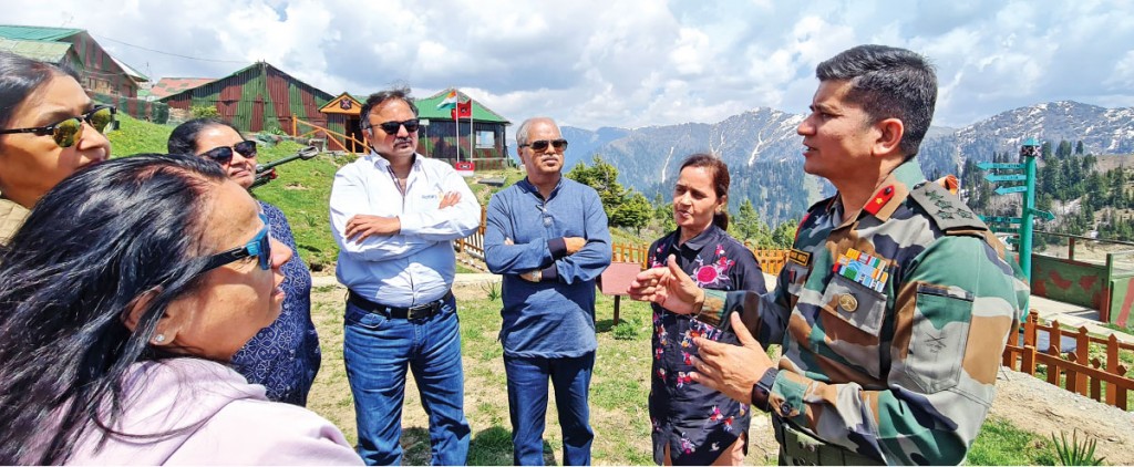 Brig Negi (R) explaining how high altitude affects soldiers and the Army’s relief work for the locals. 