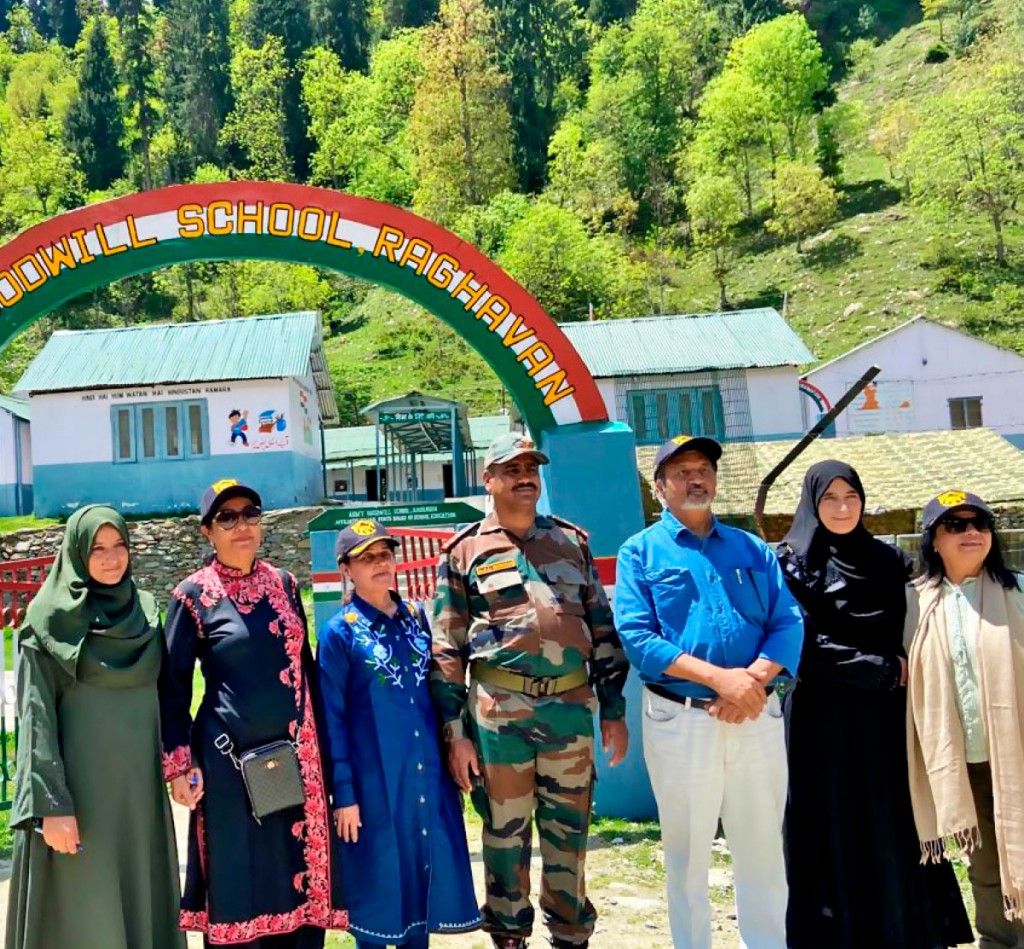 DGE Bhargava and Seema, along with Rotarians of RID 3141, teachers and Army officers, in front of one of the Army Goodwill Schools. 