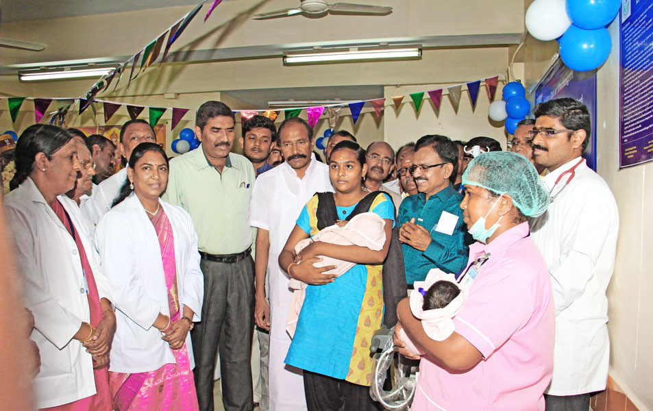 From L: CMO Dr Thenmozhi, health services joint director Dr Shanthi, then Namakkal district collector K Megraj, former TN minister P Thangamani, ­beneficiary mother with her baby, PDG T Shanmugasundaram and Dr Prakash.