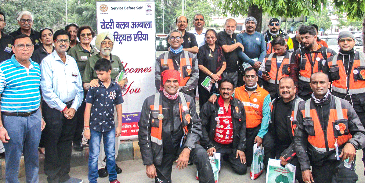 Members of RC Ambala Industrial Area with the Rotarian motorcyclists from RID 3182.