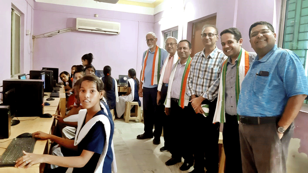 Arindham Roychowdhury (R) and members of RC Calcutta at a Siksha Labh in a school near Kolkata.