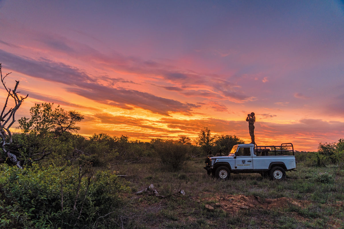 Tsakane Nxumalo scans the horizon at sunset.