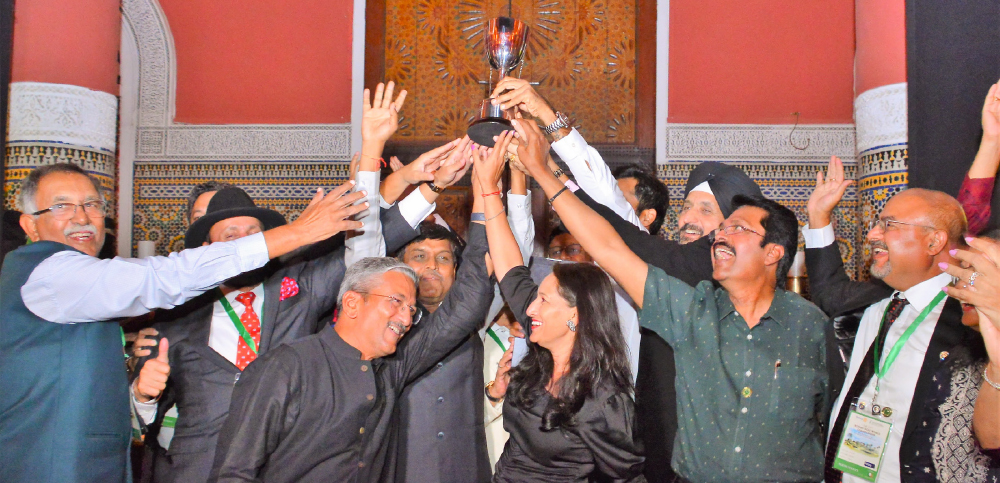 PDG Parag Sheth and Punam, and the Indian team, with the Nation Cup they won at the World Championship 2022.