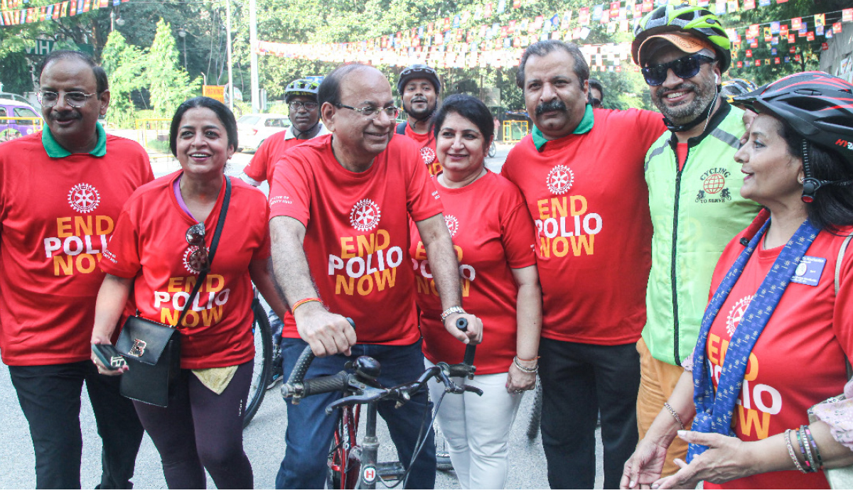 DG Ashok Kantoor rides a bicycle as part of the awareness rally.