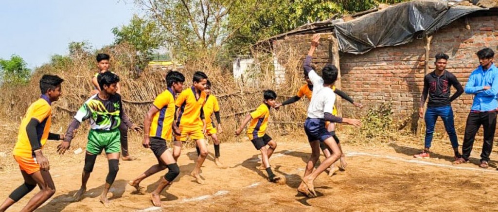 Children playing kabaddi in the village.