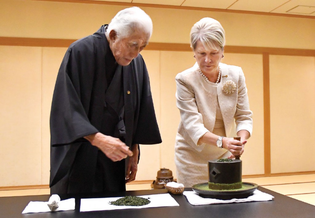 Genshitsu Sen, former grandmaster of the Urasenke tea tradition, performs a ­traditional Japanese tea ceremony for RI President Jennifer Jones during her trip to Japan in November. The tea ceremony, known as chadō, dates back centuries and embraces the arts, religion, philosophy and social life.