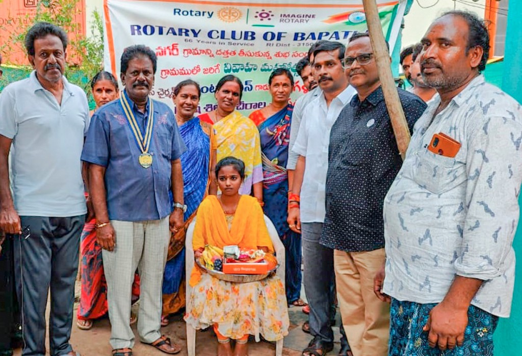 RC Bapatla president M Sudhir Kumar and members with a woman whose marriage they sponsored in Adarshnagar village