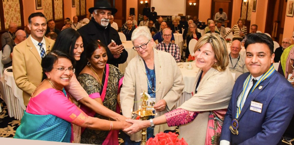 Rtn Sondra M Russ from RC Schenectady, US (centre) lights the traditional lamp in the presence of (from L) RC Ootacamund international service chair Pamela Clarke, bulletin editor Thelma Nethaji, joint secretary Shanthi, Rtn Dirt Callaert from RC Sint Niklaas, Belgium, and host club president Kamlesh Kataria at the fellowship meet.