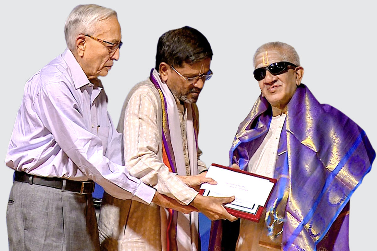 Music Academy president N Murali (L), along with Carnatic musician Neyveli Santhanagopalan, present the PMF Lifetime Achievement Award for 2020 to percussionist K Srivatsa. 