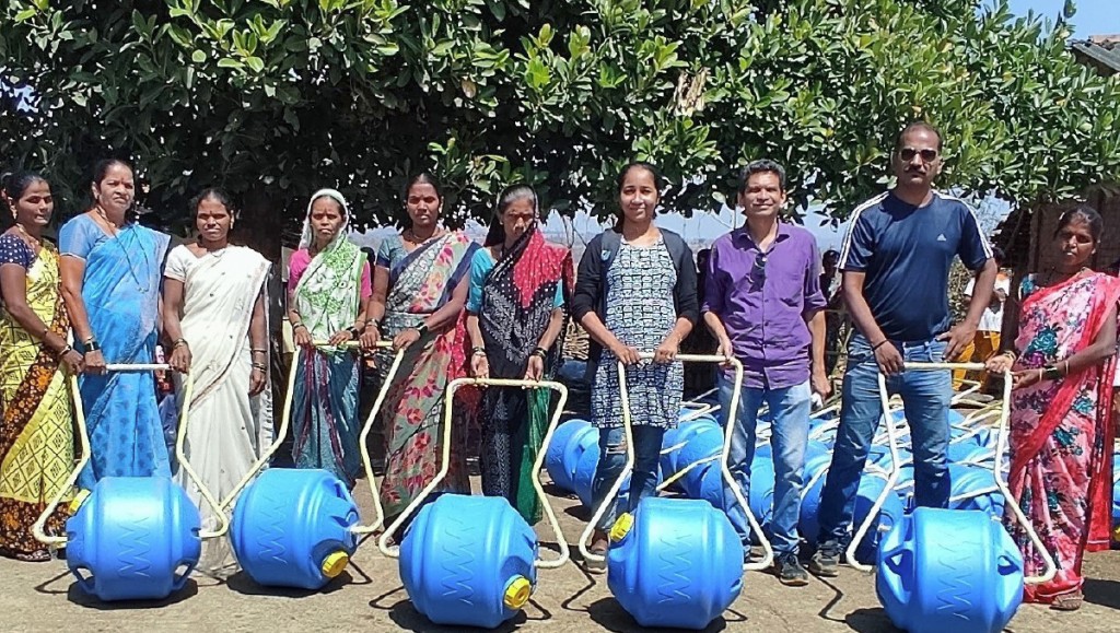 Villagers with the water wheels given to them by RC Dombivli Midtown.