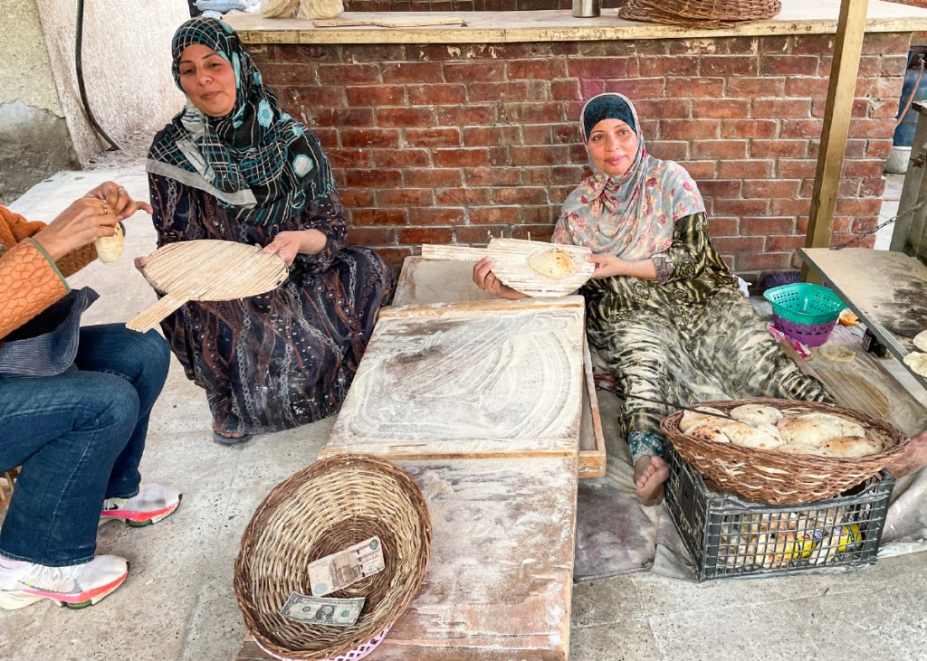 Women making pita bread.