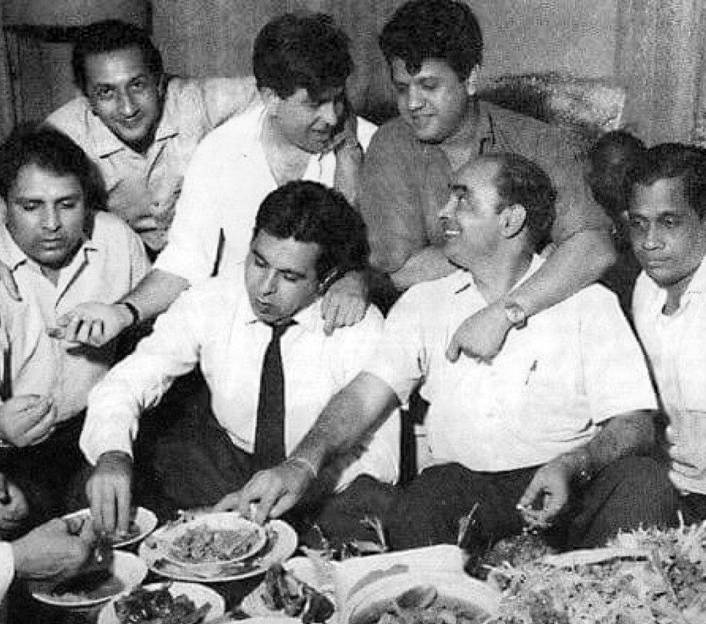 Dilip Kumar, Raj Kapoor, music duo Shankar Jaikishan at a party.