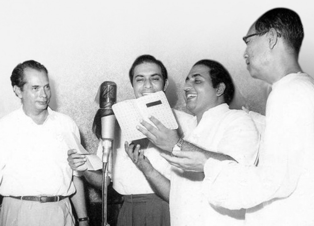 From L: Bimal Roy, Talat Mahmood, Mohammed Rafi and S D Burman during the recording session of the movie Devdas (1955).