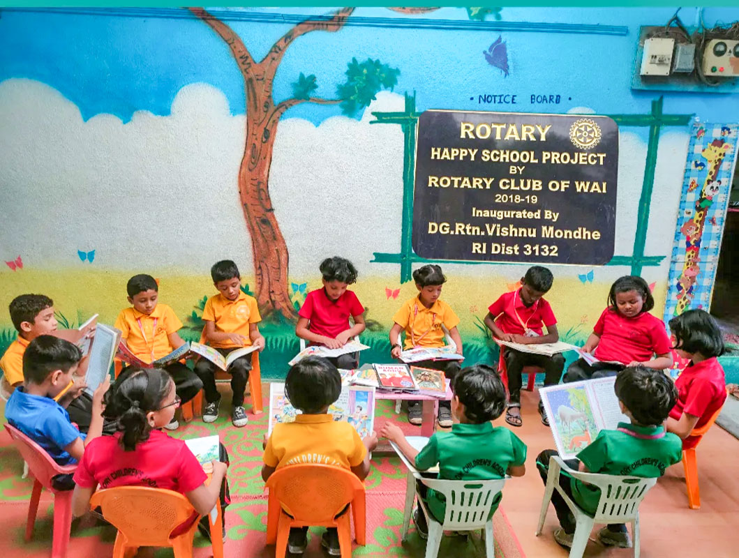 Book reading sessions in progress in various schools where children discuss the books that they read.