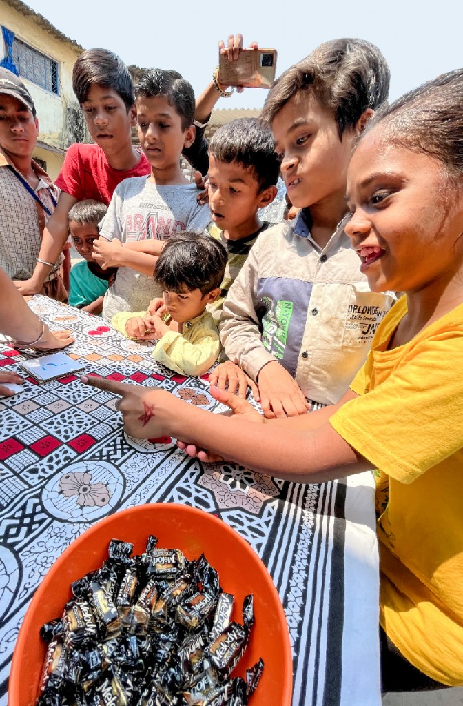 Children participating in games at the Masti Mela.