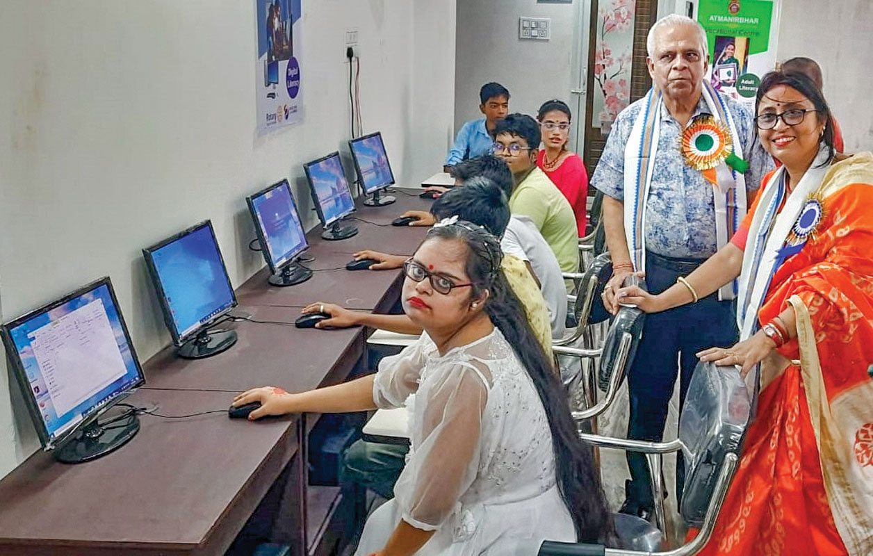 RC Calcutta president Kanak Dutt and club member Mitra at the computer training centre set up at the Niharika School in Garia.