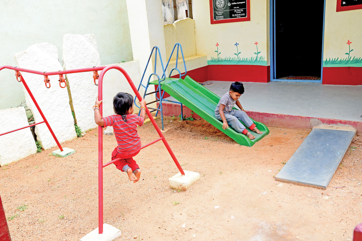 Happy children at the playground provided by Rotary.